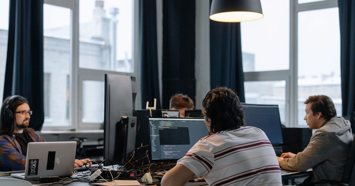 Software development team working in an office in India