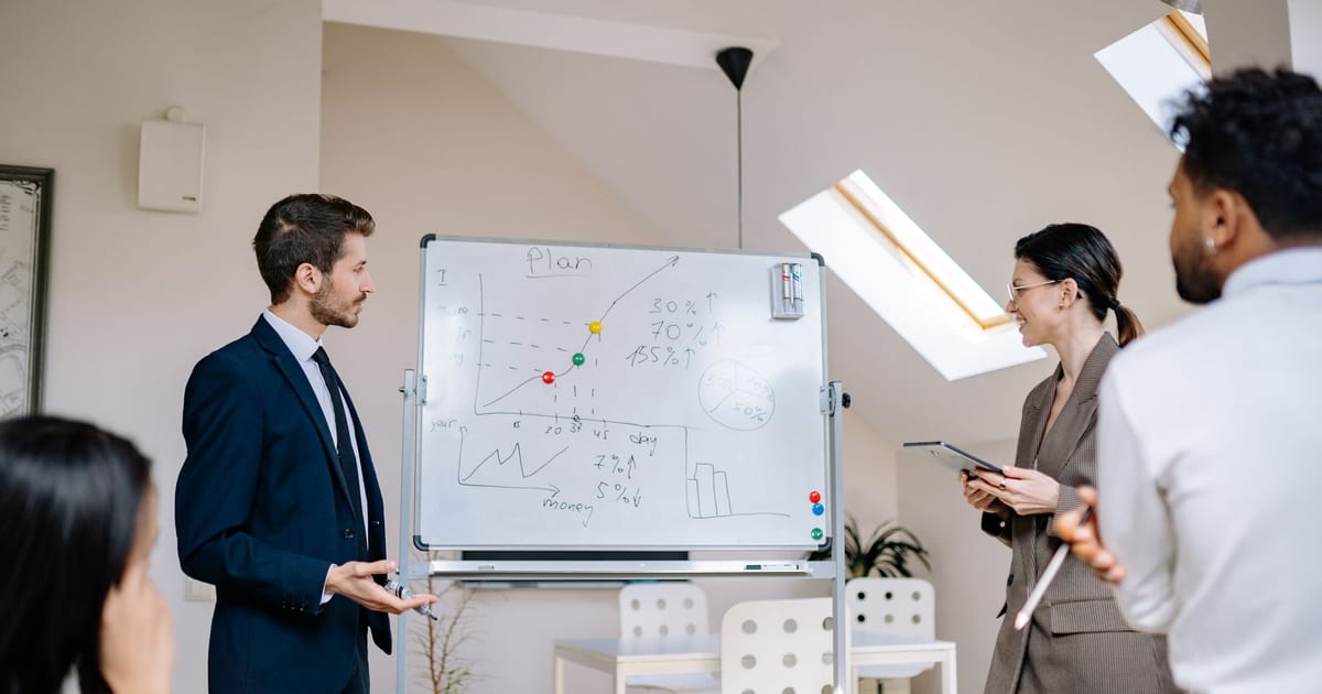 Engineering manager running a planning session with an augmented team