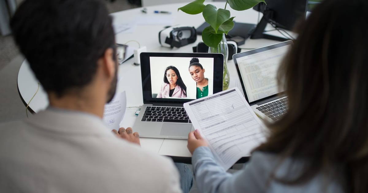 Engineering manager interviewing a developer candidate over video call