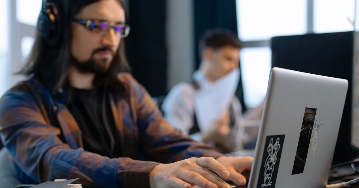 Hiring manager reviewing developer profiles on a freelance platform